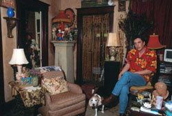John with his collection of kitsch. John with his collection of kitsch.