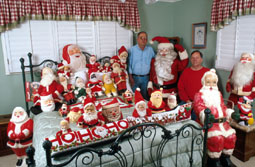 Bruce and Lee with a portion of their Santa Claus collections. Bruce and Lee with a portion of their Santa Claus collections.