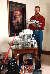 Bill with his Star Wars collection. Bill with his Star Wars collection.