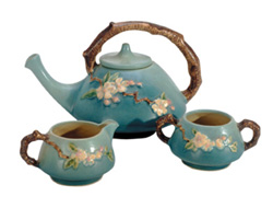 Apple Blossom tea set made by Roseville Pottery Company. Apple Blossom tea set made by Roseville Pottery Company.